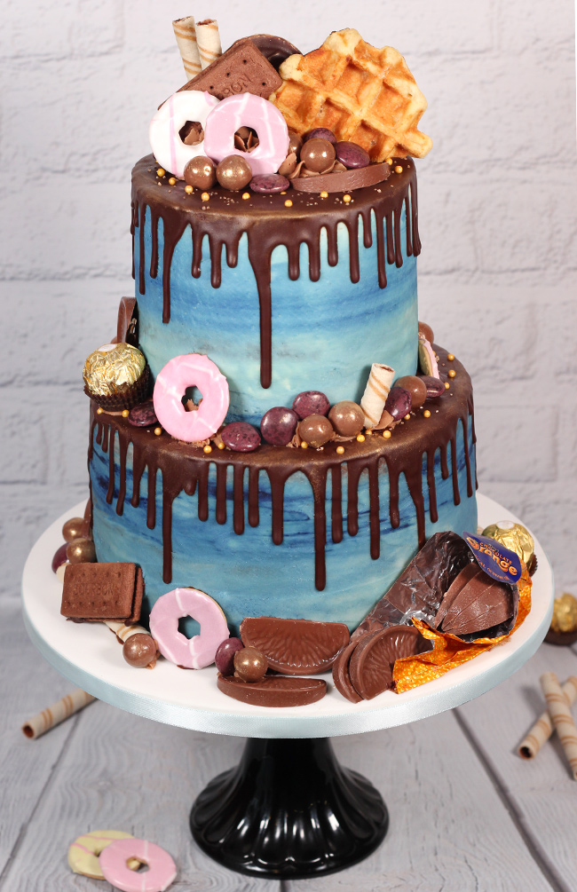 Chocolate & biscuit overload chocolate drip cake - Cakey Goodness