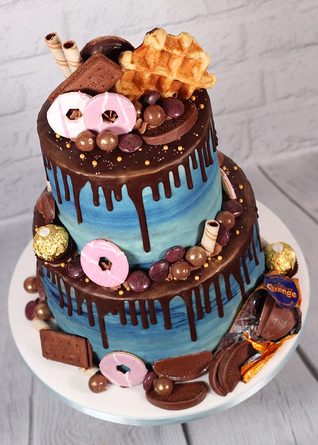 Chocolate & biscuit overload chocolate drip cake - Cakey Goodness